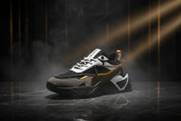 Black, white, and yellow sneaker on a white background