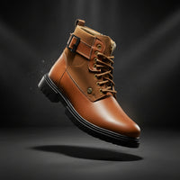 Brown leather boot with black sole on a white background