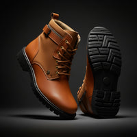 Brown leather boot with black sole on a white background