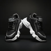 Black and gray sneakers with white soles on a white background