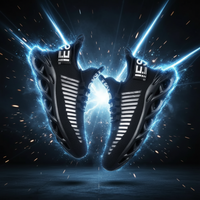 Black and white sneakers with unique design on a gray background